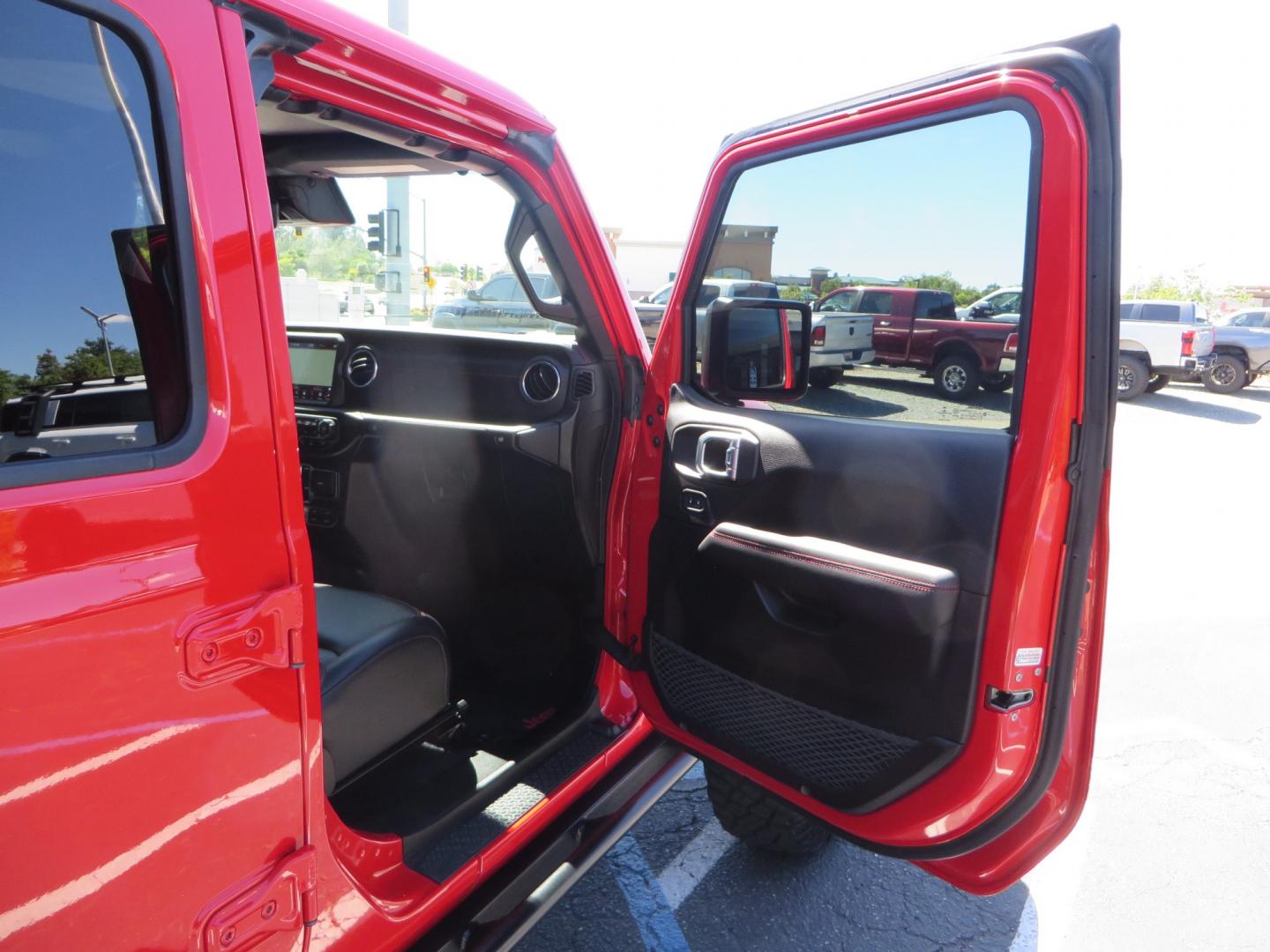 2020 Red /black Jeep Gladiator Rubicon (1C6JJTBG6LL) with an 3.6L V6 DOHC 24V engine, 6M transmission, located at 2630 Grass Valley Highway, Auburn, CA, 95603, (530) 508-5100, 38.937893, -121.095482 - Rubicon Gladiator featuring a Mopar suspension system with Fox shocks, 17" AEV wheels wrapped in 37" BFG tires, Warn Winch, Rock sliders, Cascade front license plate holder, Impact bedliner, Built Right Industries bed Molle panels, and Window tint. - Photo#47